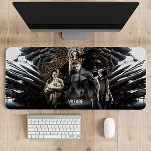 May include: A black and white gaming mouse pad featuring a graphic of characters from the video game Resident Evil Village. The characters are standing in front of a large, dark, gothic castle. The text "VILLAGE" and "RESIDENT EVIL" is printed on the mouse pad.