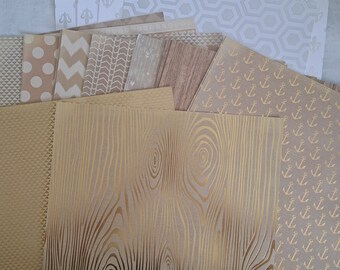 21 sheets of kraft and metallic cardstock- silver, white, tan, gold kraft patterned paper most is about 12"