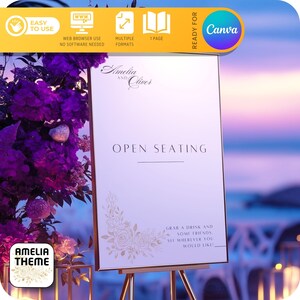 May include: A white sign with gold floral accents and the text "Amelia and Oliver" and "Open Seating" with the message "Grab a drink and some friends, sit wherever you would like".
