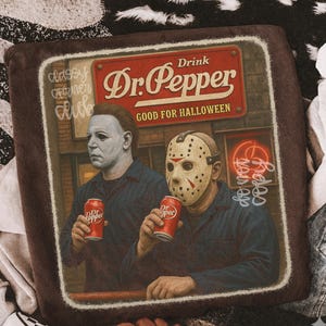May include: A brown square throw pillow featuring a graphic of two horror movie characters holding red Dr. Pepper soda cans. The text reads Drink Dr. Pepper Good for Halloween, classy corner club, and do not copy. The characters wear dark shirts.