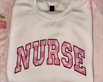 Sudadera con bordado de apliques de enfermera