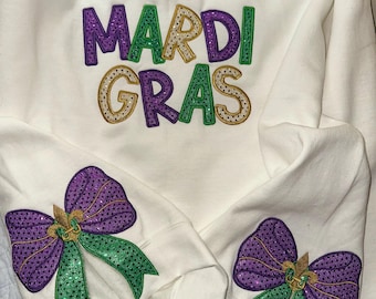 Sudadera con lazo lateral de Mardi Gras