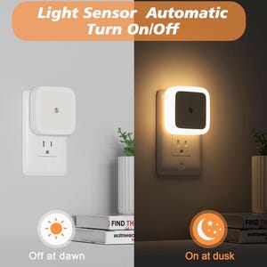 May include: A white night light plugged into a wall outlet. The night light has a square shape with rounded corners and a light sensor. The text "Light Sensor Automatic Turn On/Off" is displayed above the night light. The night light turns on at dusk and off at dawn.