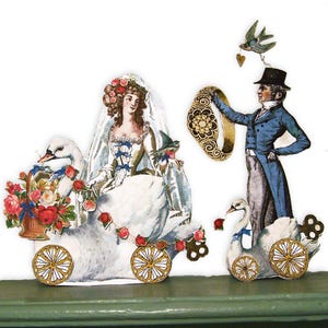 Puede incluir: Un recorte de papel de estilo vintage que representa una escena de boda. La novia está sentada en un carruaje de cisne adornado con flores, mientras que el novio sostiene un anillo. Un pájaro con un corazón vuela por encima. Fondo blanco.