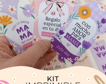 May include: A hand holding several gift tags with floral and bow designs. The tags have text in Spanish, including "Regalo especial en tu día" and "Con mucho amor para mamá." The tags are part of a printable Mother's Day kit.