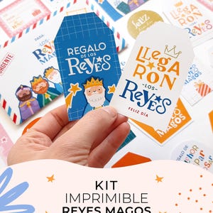 May include: A collection of colorful gift tags and stationery with illustrations of the Three Wise Men. The tags feature text in Spanish, including "Regalo de los Reyes" and "Llegaron los Reyes." The kit includes stickers and labels with festive designs.