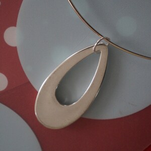 Red Hot Mod 1980's Does Swingin 1960's Large Lightweight Silver Teardrop Cutout Medallion Necklace image 5