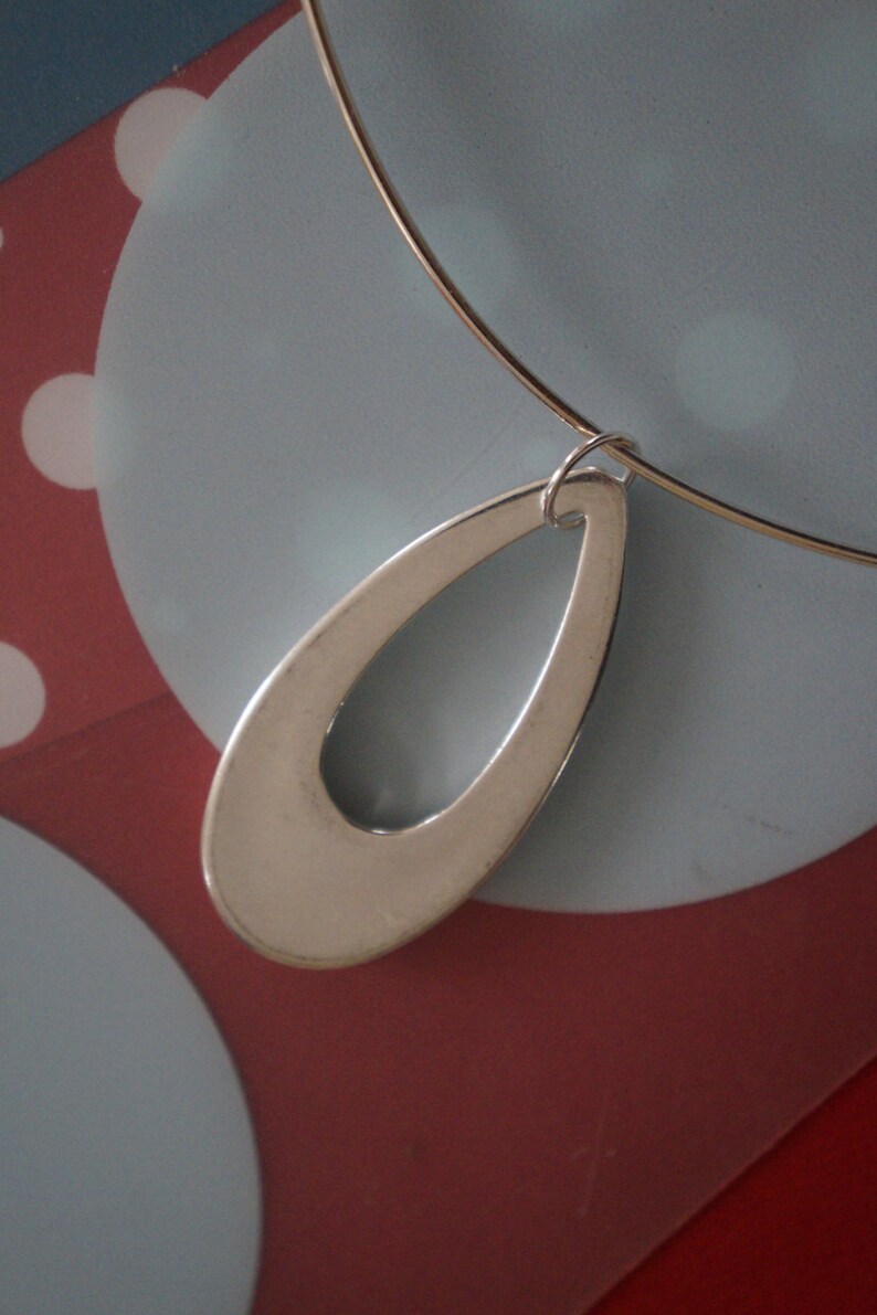 Red Hot Mod 1980's Does Swingin 1960's Large Lightweight Silver Teardrop Cutout Medallion Necklace image 5