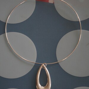 Red Hot Mod 1980's Does Swingin 1960's Large Lightweight Silver Teardrop Cutout Medallion Necklace image 4