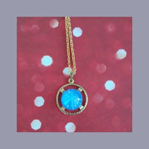 It&#39;s a Periwinkle Moonscape! Periwinkle Blue Glass Starburst Cabochon Set in a Goldtone Base Charm on Gold Plated Chain- Feel the Moonbeams