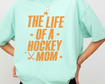 Comfort Colors® The Life of A Hockey Mom Shirt, Hockey Mama Sweatshirt For Game Day, Funny Sports Mom T-Shirt, Ice Hockey Gift Music Fan Tee