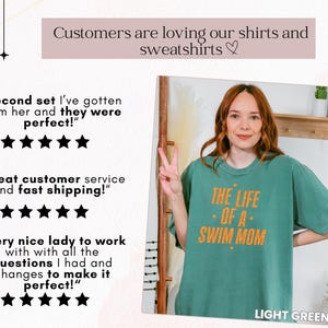 May include: A light green t-shirt with the text "THE LIFE OF A SWIM MOM" in orange. The image also includes customer reviews and the text "Customers are loving our shirts and sweatshirts".