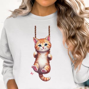 Süßes Kätzchen Schaukel T-Shirt Design, Orange getigerte Katze Clipart, verspielte Katzen Grafik, Haustierliebhaber, digitale Kunst, sofort download