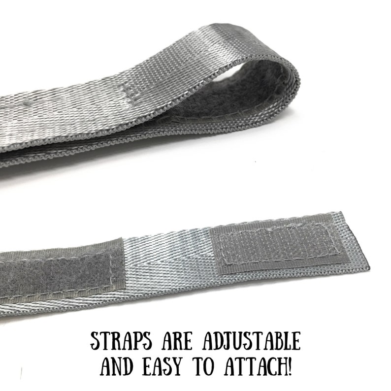 May include: Two close-up images of a gray adjustable strap with hook and loop fasteners. The text "STRAPS ARE ADJUSTABLE AND EASY TO ATTACH!" is printed below the images.