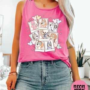 A woman wearing a pink tank top with a cartoon character design and a collage of smaller images of the same character.