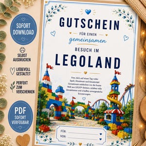 May include: A printable gift voucher for a visit to Legoland, featuring a colourful illustration of a brick-built theme park entrance, blue text, and decorative heart and leaf accents. The document includes fields for names and descriptive German text.