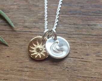 Eclipse Charm Necklace. Sterling silver and 14k gold full Sun and Moon charm necklace. Stamped discs. Sterling silver and gold necklace.