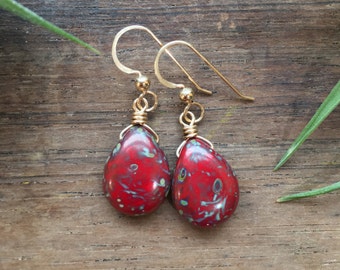 Rustic Red Drops. Boho Czech glass. Sterling silver or 14k gold fill. Puffy red glass drop earrings with picasso finish. Rustic earthy drops