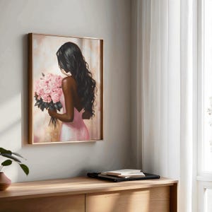 May include: A painting of a woman with long black hair holding a bouquet of pink flowers. She is wearing a pink dress and is standing in front of a light brown background.