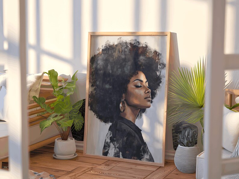 May include: A framed painting of a woman with a large afro, wearing a black jacket and earrings. The woman has her eyes closed and is looking to the right. The background is white with a light gray wash.
