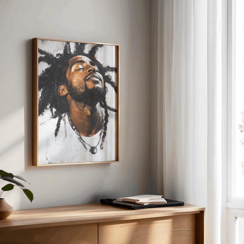 May include: A framed painting of a person with dreadlocks looking up. The person is wearing a white shirt and a silver necklace. The painting is in a gold frame.