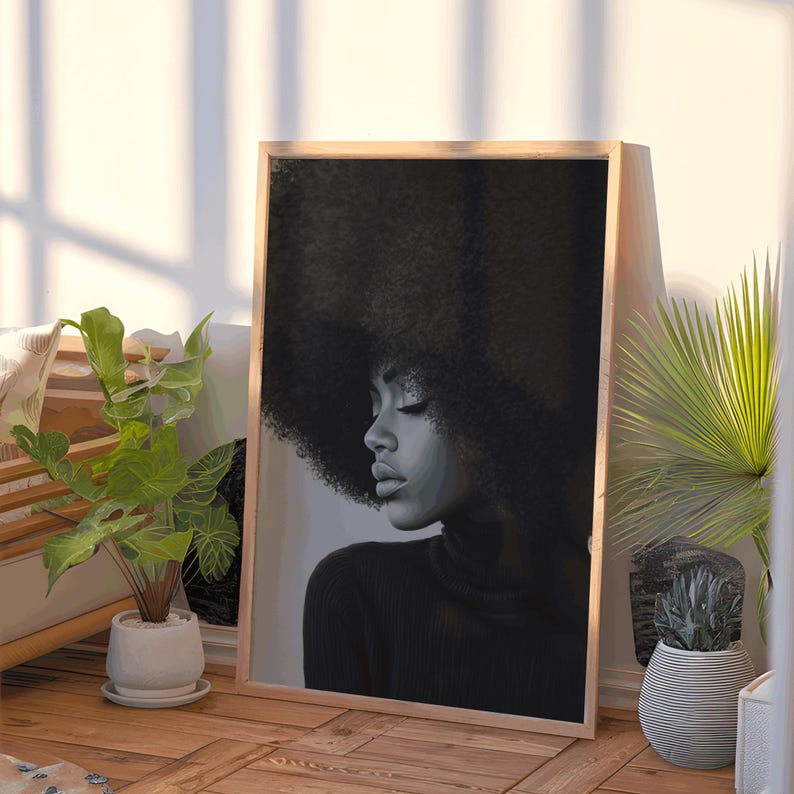 May include: Black and white portrait of a person with an afro hairstyle wearing a black turtleneck sweater.