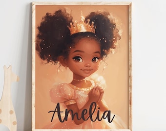 May include: A digital illustration of a young girl with brown skin and curly black hair wearing a gold crown and a pink dress. The girl is smiling and holding her hands together in front of her. The background is a soft peach color. The name "Amelia" is written in black cursive below the girl.