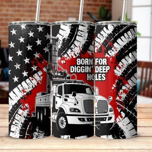 May include: Three stainless steel tumblers with straws. Each tumbler has a design featuring a black and white tyre track pattern, a red and black American flag, and a white truck with the text "BORN FOR DIGGIN' DEEP HOLES".