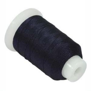 May include: A spool of dark blue thread wound on a white plastic bobbin.