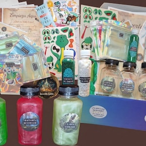 May include: A dinosaur-themed kit with various bottles and containers filled with colorful liquids and beads. The kit includes stickers, instructions, and small bags. The bottles are labeled with dinosaur-related names, and the overall theme is a fun, educational activity.