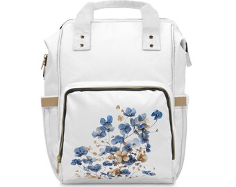 Mochila multifuncional para pañales con delicado diseño floral