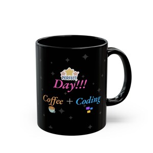 May include: Black ceramic mug with the text "PERFECT Day!!! Coffee + Coding" in colorful lettering. The mug features a coffee cup icon and computer screen icons. The mug has a black handle and a black interior.