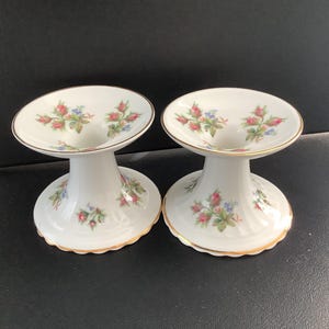 Pair of Royal Albert bone china candle holders with moss rose pattern