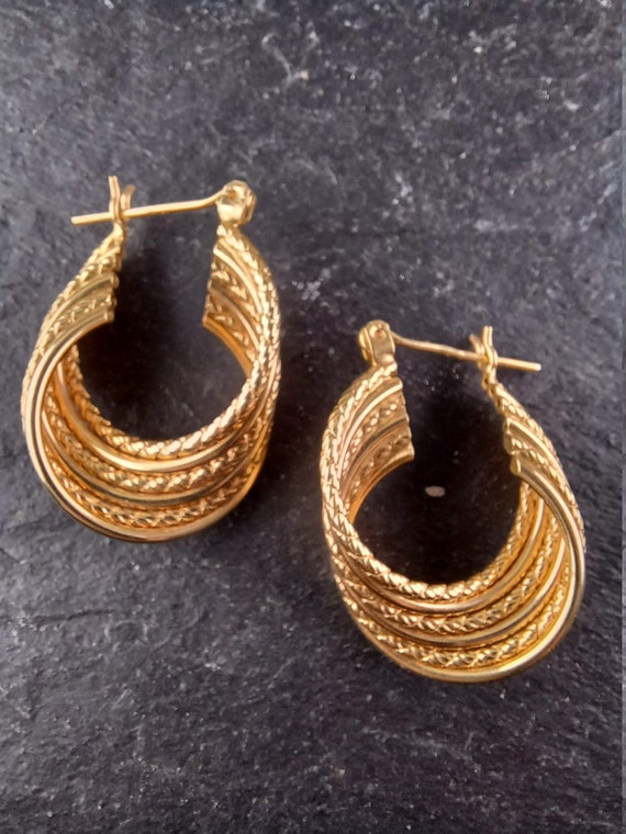 Vintage 14 kt yellow gold twist hoop earrings