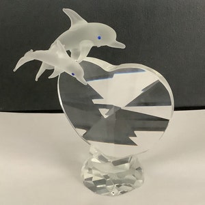 Vintage Sorelle crystal Heart Paperweight with mother and baby dolphins.