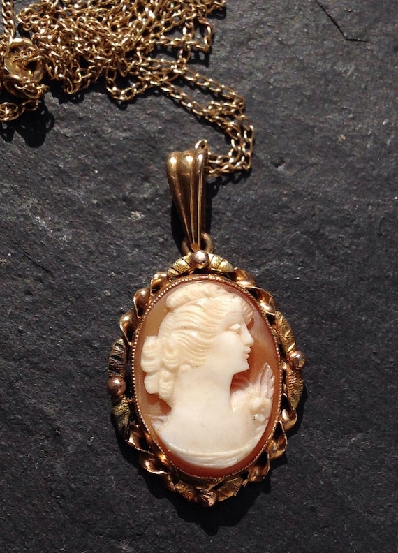 Antique 10 kt carved cameo necklace with 14 kt gol