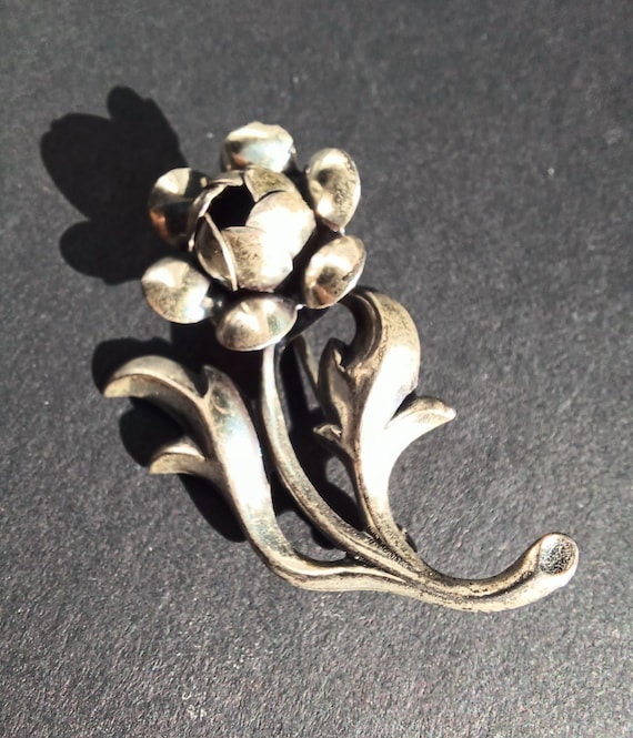 beau sterling brooch