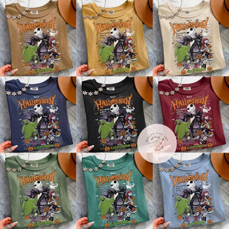 May include: Nine t-shirts in various colors, each featuring a Halloween-themed graphic. The design includes Jack Skellington, Sally, and other characters from "The Nightmare Before Christmas." The text "This is Halloween" is prominently displayed.
