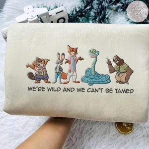 May include: A rustic wooden sign with the text "Welcome to our home" in white lettering. The sign features a distressed finish and a simple, inviting design, perfect for front door decor.