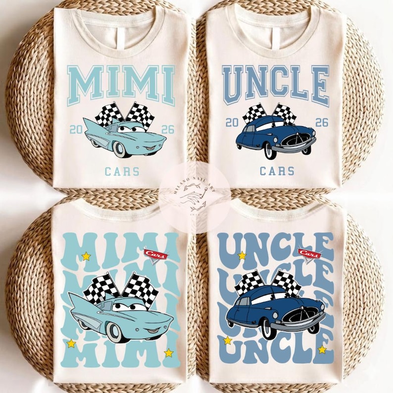 May include: Four cream-colored t-shirts with blue text and car graphics. Two shirts say "MIMI" and two say "UNCLE". The car graphics have checkered flags. The shirts are on a woven, circular surface.