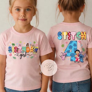 May include: Pink t-shirts with colorful graphics. The front of the shirt says "Birthday girl" with cartoon characters. The back of the shirt says "Stitch 4" with Stitch and Lilo characters. The shirts are worn by a young girl.