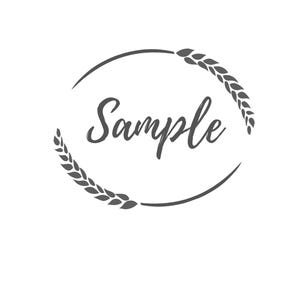 May include: A dark grey design featuring the word "Sample" in a cursive font, enclosed by an oval and wheat sprigs. The design is set against a white background, creating a simple, elegant aesthetic.