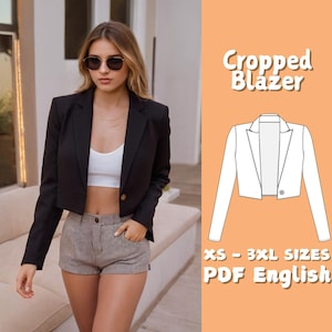 May include: A black cropped blazer with a single-button closure. The image also includes a diagram of the blazer and text that reads "Cropped Blazer" and "XS - 3XL SIZES PDF English". The blazer is worn with a white top and shorts.