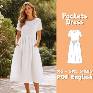 Puede incluir: Un vestido midi blanco con mangas cortas y bolsillos. El vestido tiene un corpiño ajustado y una falda fruncida. La imagen también incluye un diagrama del vestido y el texto "Pockets Dress", "XS - 5XL SIZES" y "PDF English".