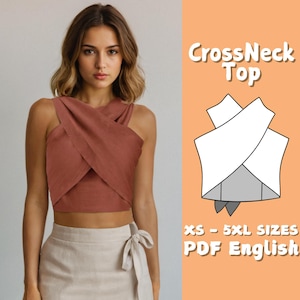 以下が含まれることがあります： 錆色のクロスネックトップ。画像には、トップのデザインの白いイラストと「CrossNeck Top」と「XS - 5XL SIZES PDF English」の文字も含まれています。トップは、明るいベージュのスカートと組み合わせています。