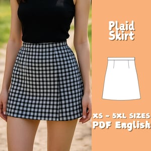 Może przedstawiać: Czarno-biała spódnica w kratę. Spódnica to mini spódnica z klasycznym wzorem w kratę. Obraz zawiera również tekst "Plaid Skirt" i "XS - 5XL SIZES PDF English".