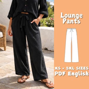 May include: Black lounge pants with a drawstring waist and pockets. The pants are part of a matching set, paired with a black top. The image also includes a diagram of the pants and text that reads "Lounge Pants" and "XS - 5XL SIZES PDF English."