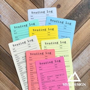 May include: A set of eight colorful reading log cards with the text "Reading Log" printed on each card. The cards are in various colors, including pink, yellow, green, and blue. Each card has a space for the reader's name, month, goal, year, title, author, owned, borrowed, format, pages, rating, and start and end dates.