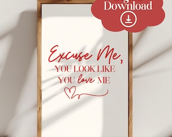 May include: Printable digital download of a red and white graphic with the text "Excuse Me, You Look Like You Love Me" with a red heart.