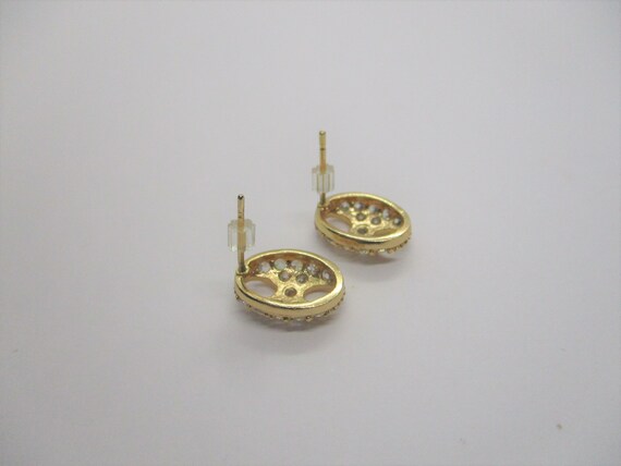 Rhinestone stud earrings: Sparkly 1960s gold tone… - image 4